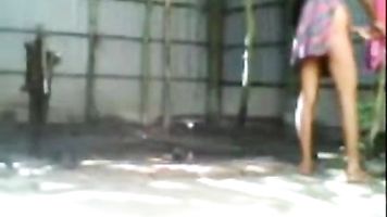 Young Indian married couple fucking outdoor in middle of shower recorded by their neighbor from his window.