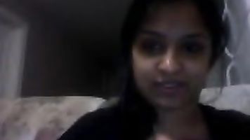 Sweet Noida girl Angel sitting naked on webcam pressing her boob and fingering her hairy pussy.