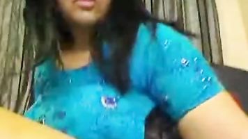 Big busty Pakistani punjabi kuri from London, UK on webcam in traditional shalwar kameez pressing her milky melons and touching her pussy.