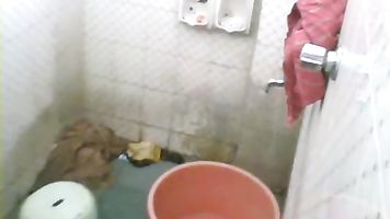 Indian housewife free from her daily household work taking shower on weekend unaware that her man fixed a hidden cam to record her hot shower. video2porn2