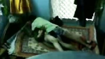 Naughty Hyderabadi guy setting up a hidden cam then getting his girl in bed stripping her off her top taking off her bra to expose and suck her juicy tits one by one and fucked in missionary style until he cum inside her girlfriend.