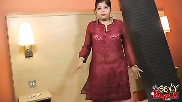 Desi bitch Rupali poses topless laying naked in bed