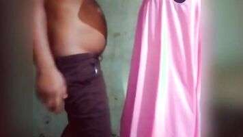 The milf, dressed in a nightgown, performs a beautiful dance with husband